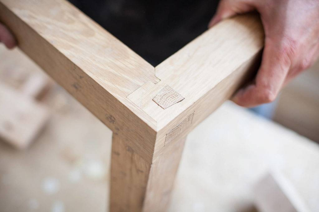 wooden table being made by carpenter