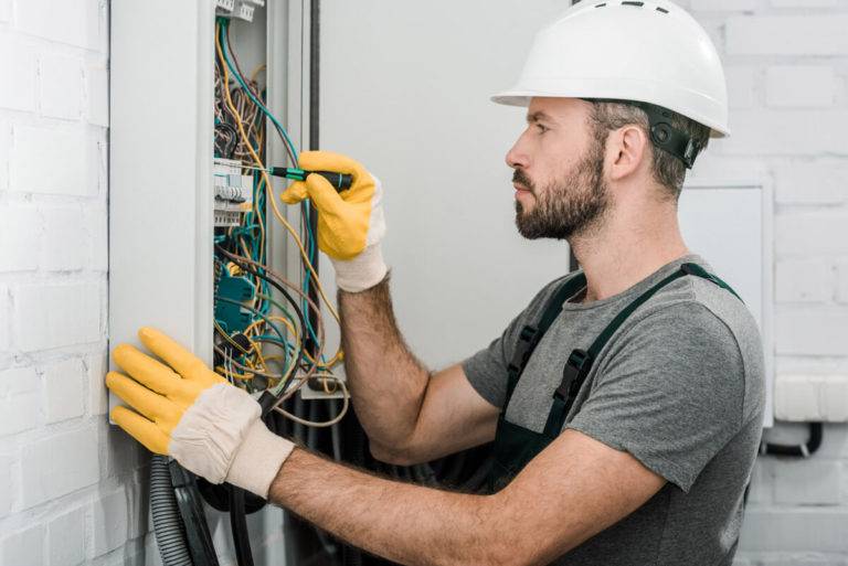 electrician with fuse box